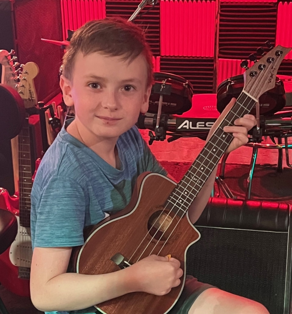 Zane switched and loves playing Ukulele