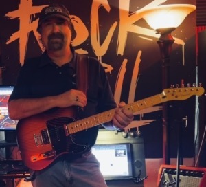 Karney standing with Telecaster