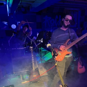 Thanksgiving jam with Skyler on Bass and Shane on Drums My son jamming with the fog and my brother crossing drum sticks in the background