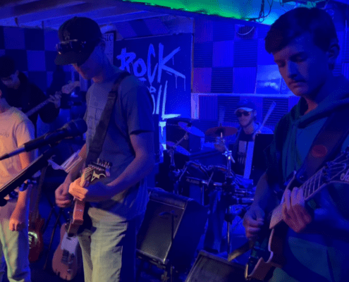 Student rock band sessions and live performance workshops at NoCo Guitar in Greeley, Colorado